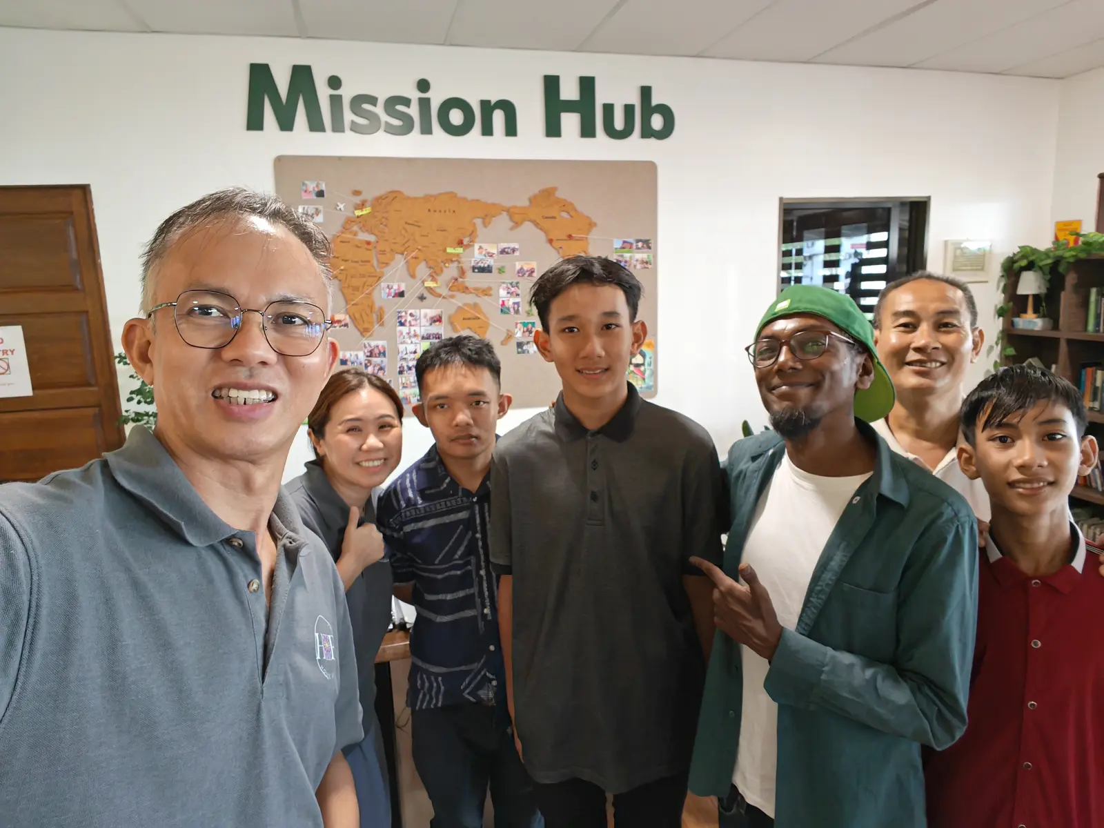 Pastor Jony with guests from many nations at the Mission Hub
