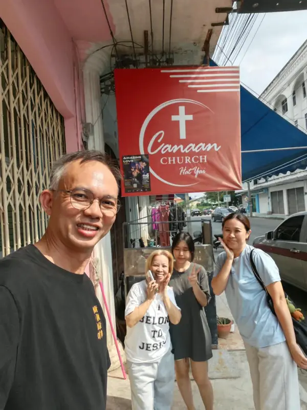 Pastor Jony with sisters outside Canaan Church in Hat Yai